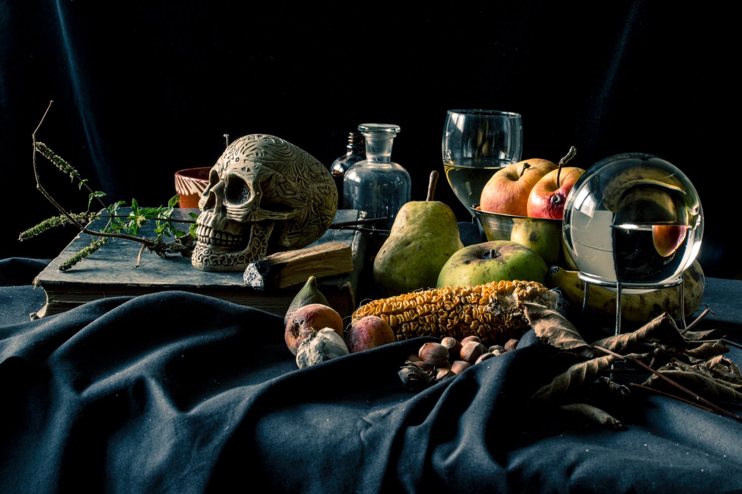 still life photography lighting arrangement with skull and fruit